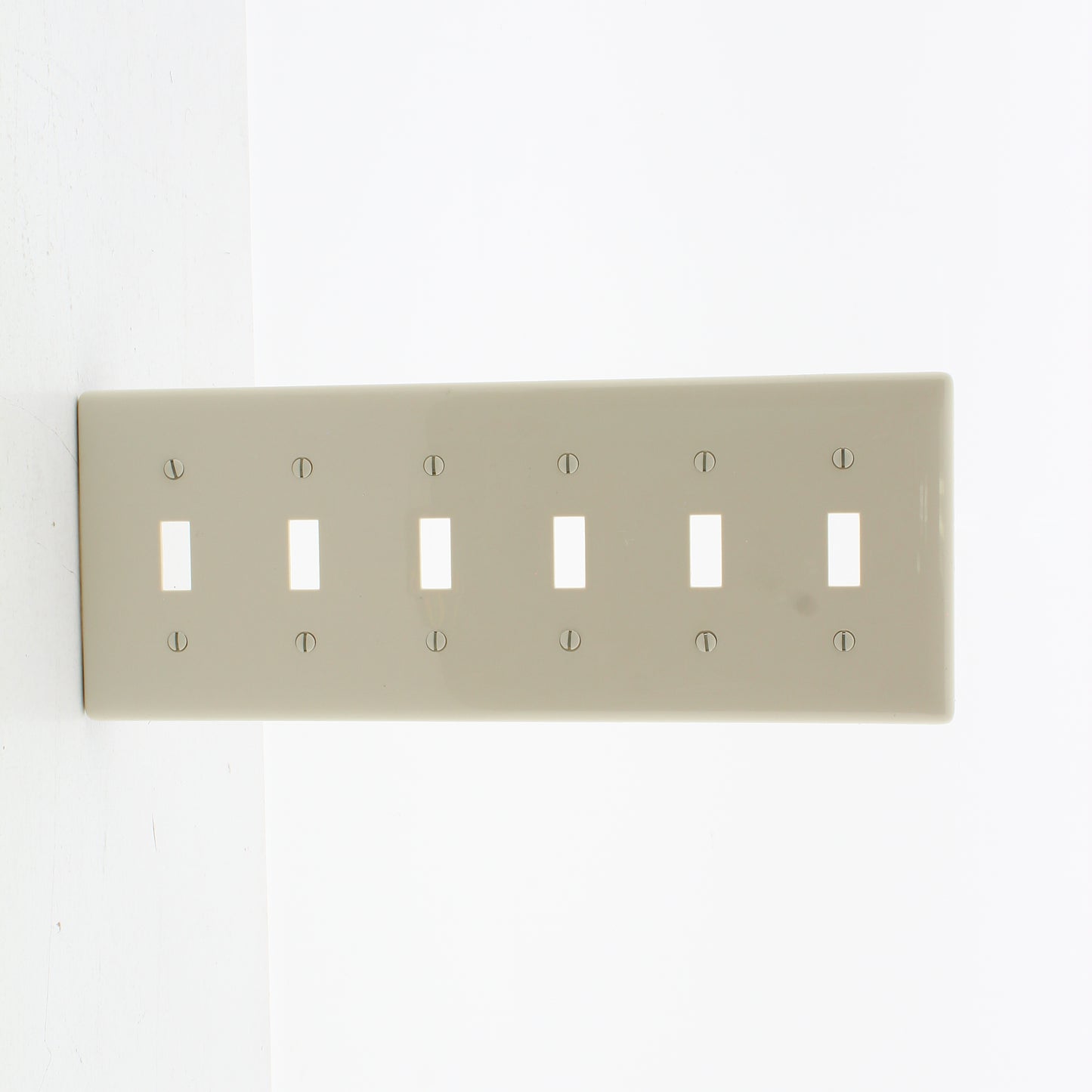 Hubbell NP6LA Light Almond 6-Gang Toggle Unbreakable Standard Wallplate Cover